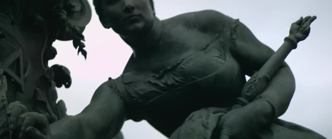 The statue is of people posing