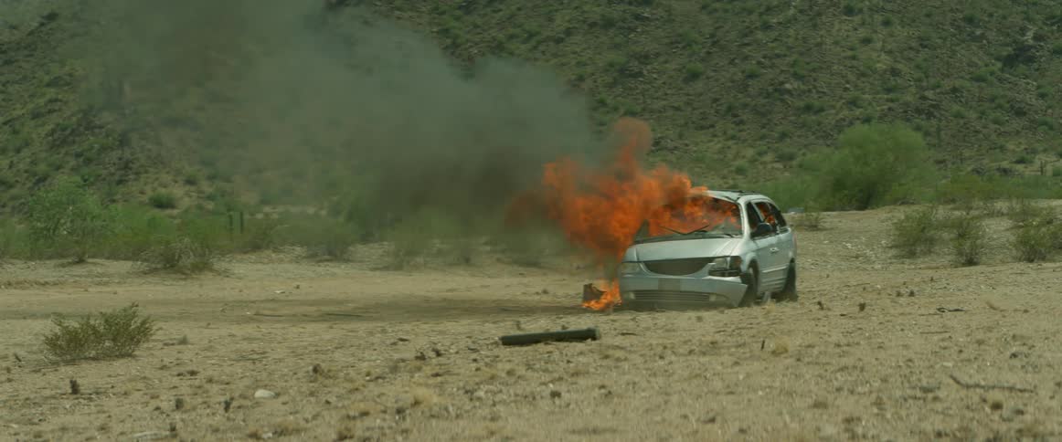 Soldiers running away from explosion