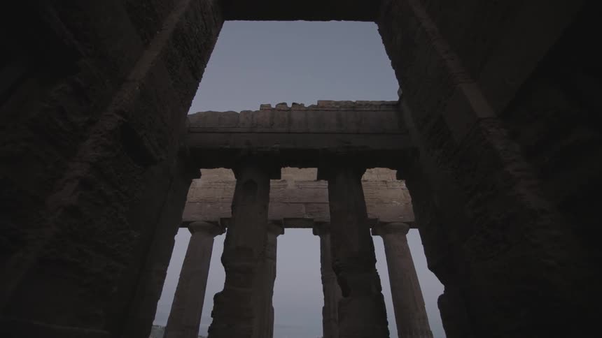 Inside a stone building at dusk