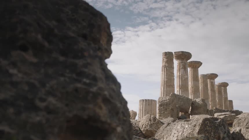 Ancient stone pillars on a cloudy day