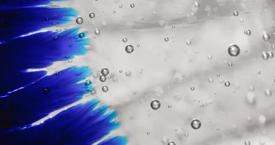 The blue strands of color move in the gel