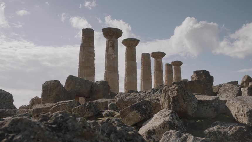 A large multi column monument in the daytime