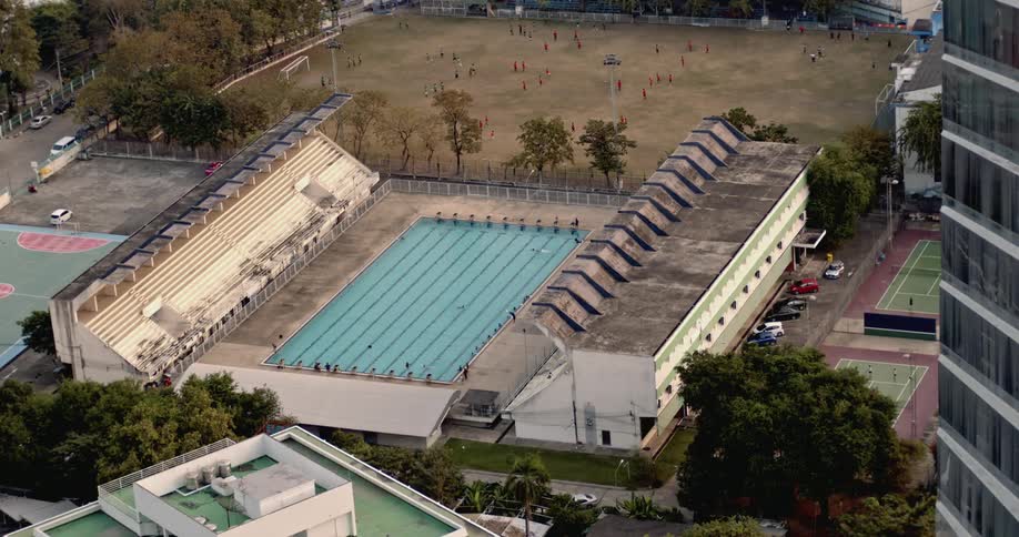Athletes move about various sports fields and sports courts