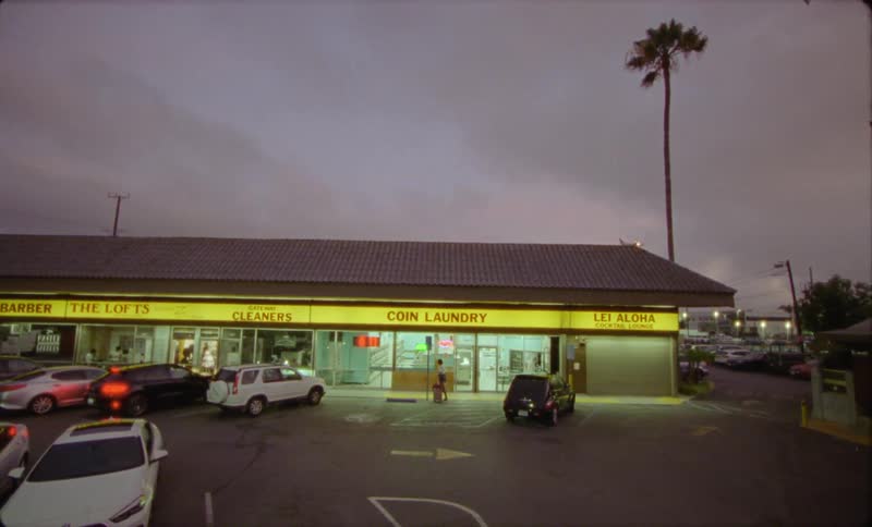 Exterior view of laundry next to car park