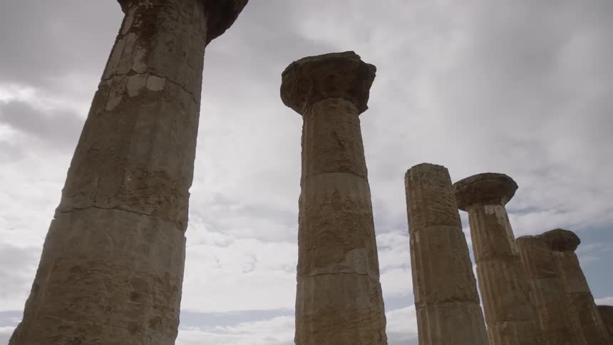 Columns from an ancient building rise towards the sky