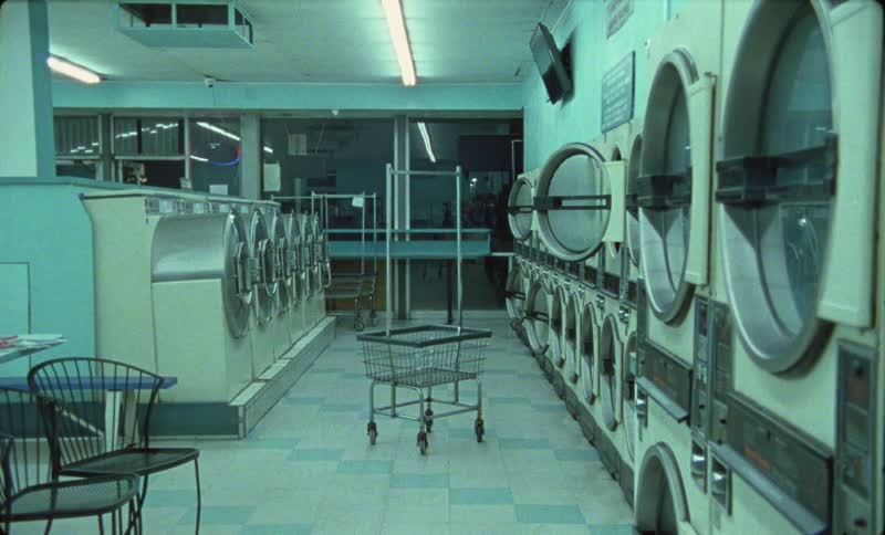 A laundromat is completely empty at night