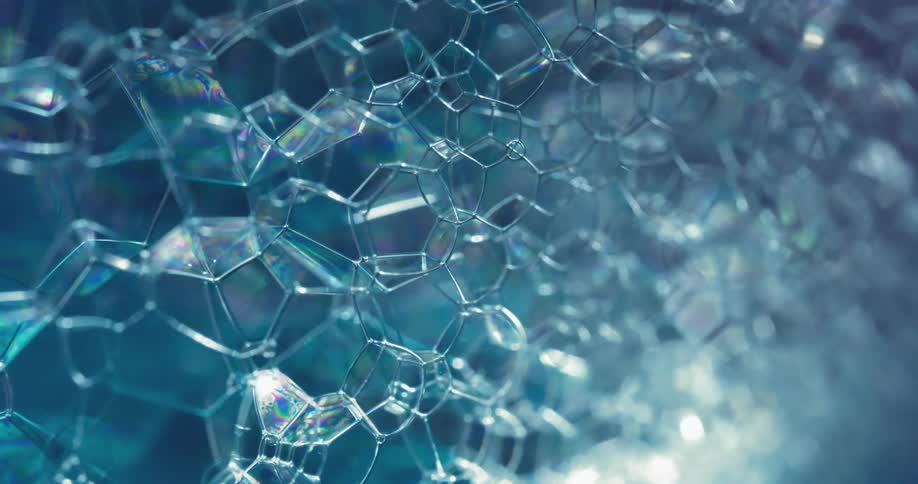 A close up of popping bubbles
