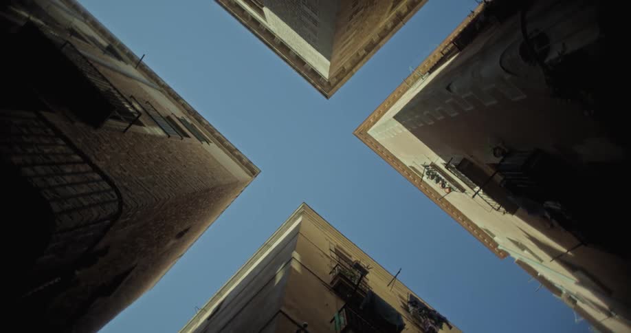 Looking up at Gothic Quarter buildings