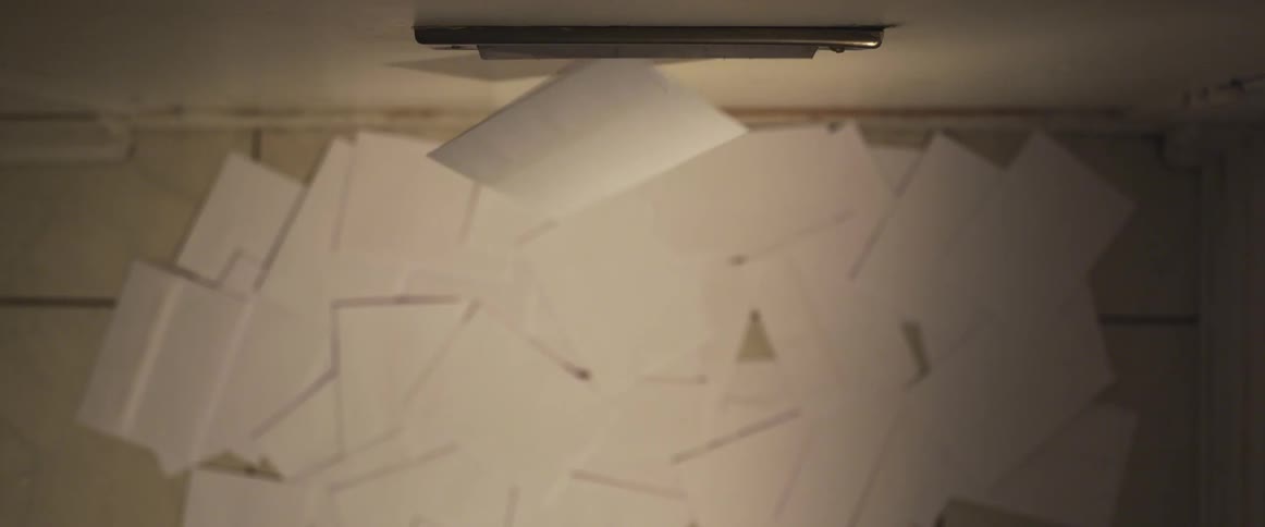 Letters falling through a slot
