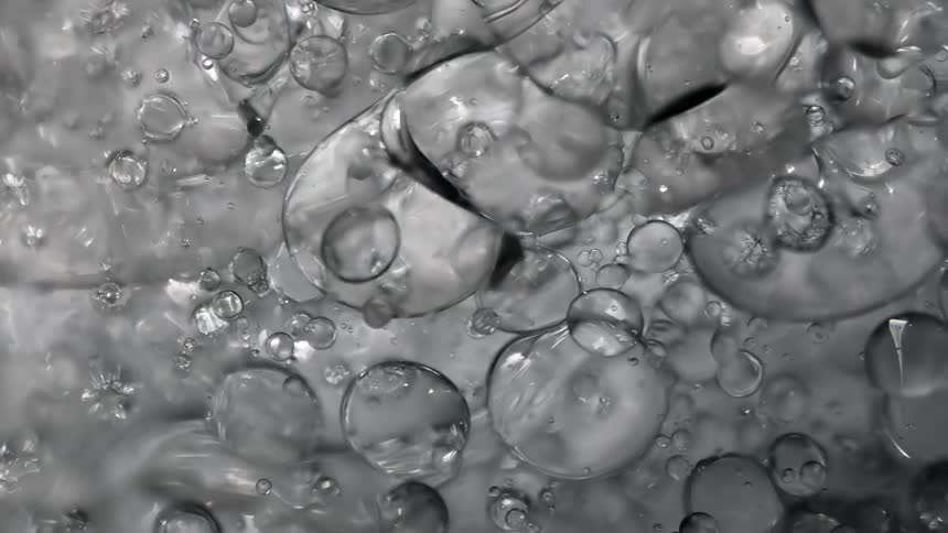 Many bubbles reflect light as they move and float