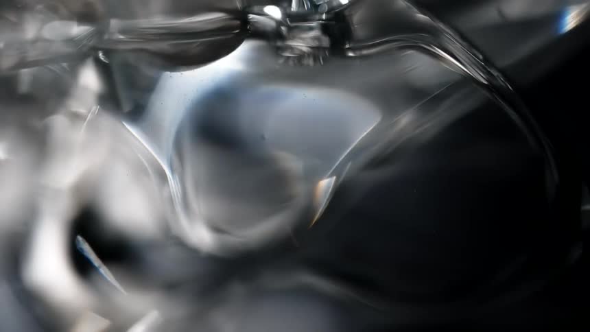 Flowing and rippling clear liquid