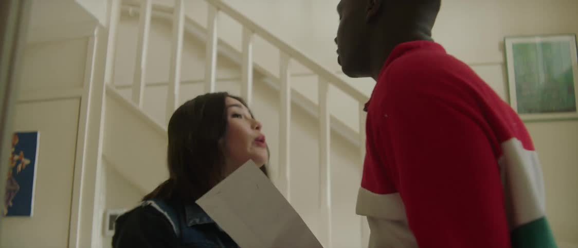 A man and woman arguing at home