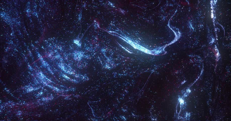 Blue and purple pinpoints of light glitter like stars in the darkness moving in rippling space