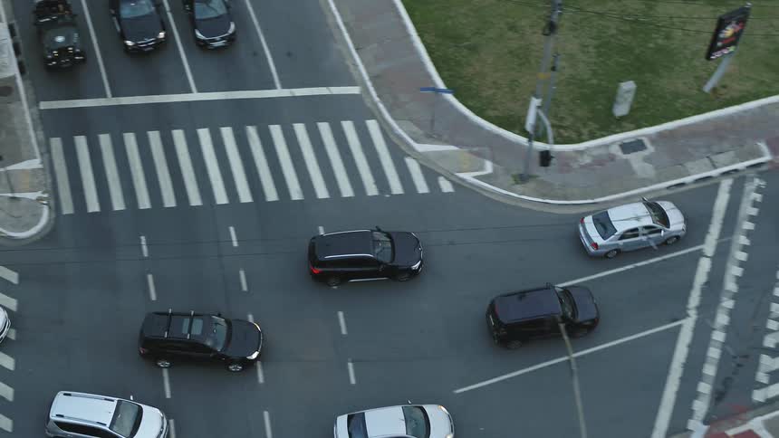 Aerial view of vehicles on the busy traffic in the city streets