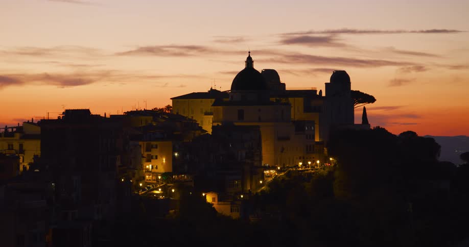 A domed castle sits atop a mountain