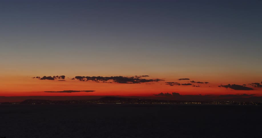 Clouds floating in the sky at sunset