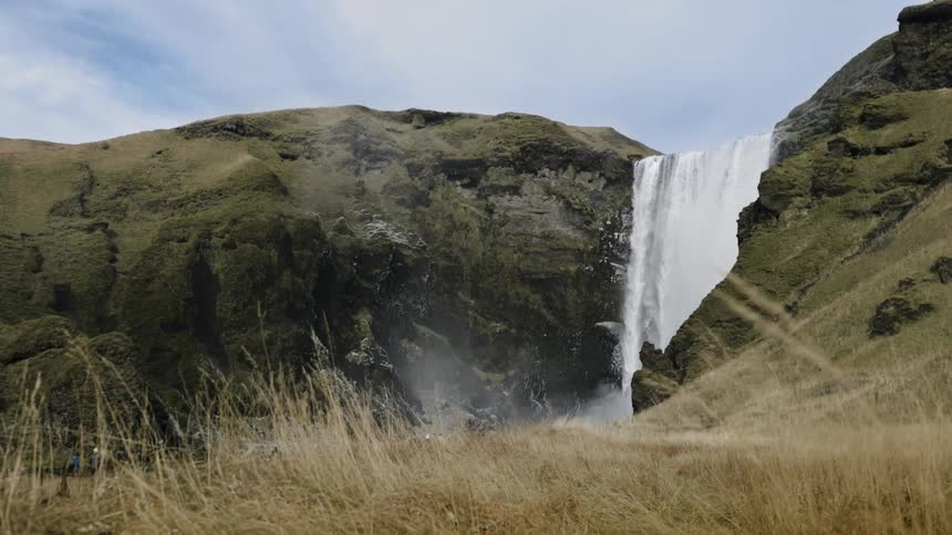 Waterfall cascades down mountainside