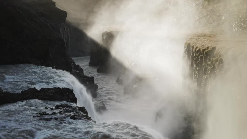 The waterfall is creating a mist