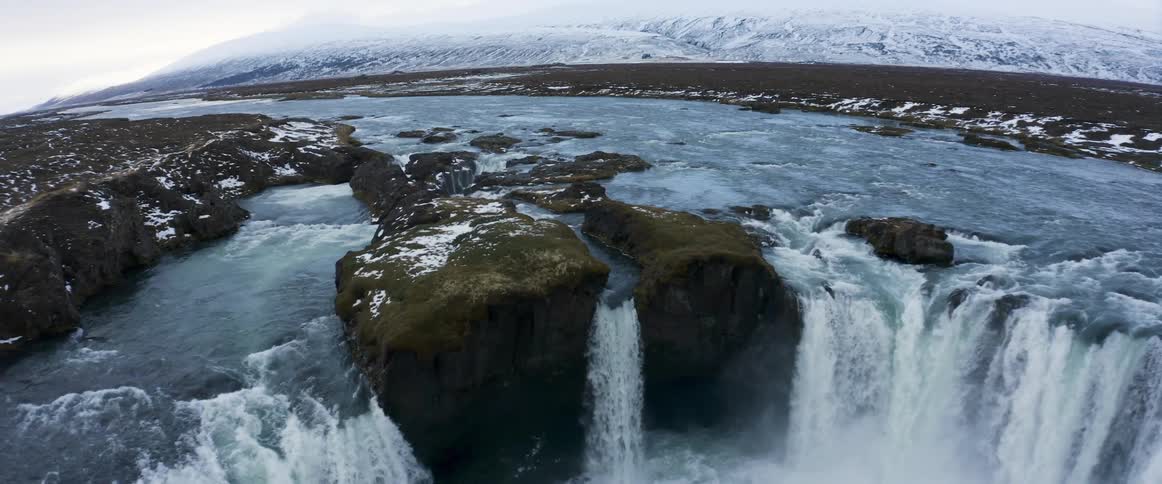 Aerial view of river and waterfall