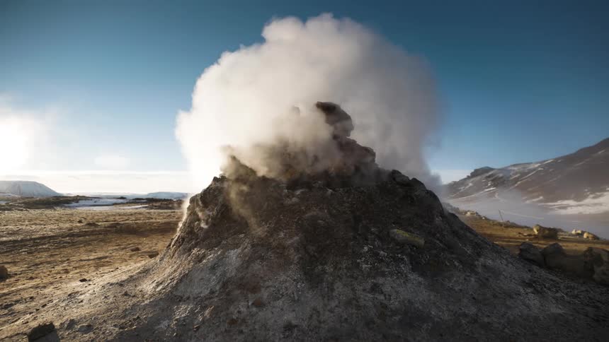Steam rising from a volcano in nature