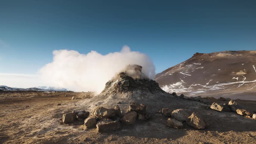 Steam is rising on the mountain