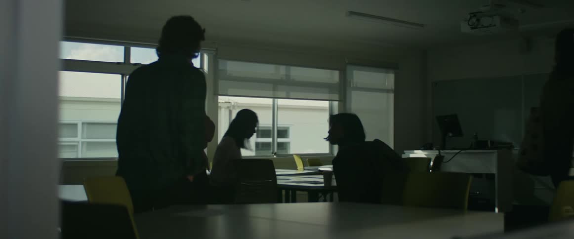 Students enter the classroom and sit