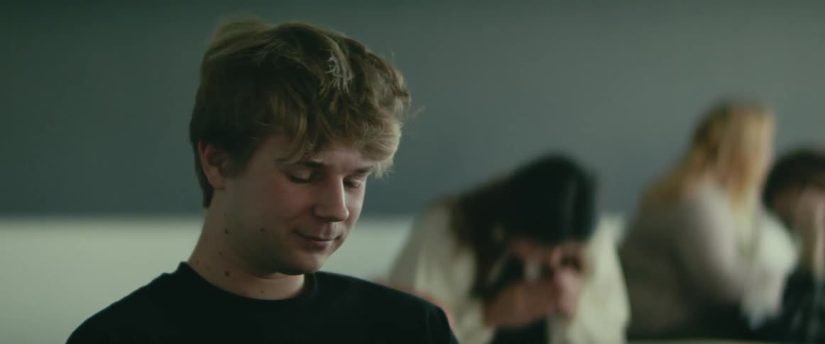 Students talk and laugh in class