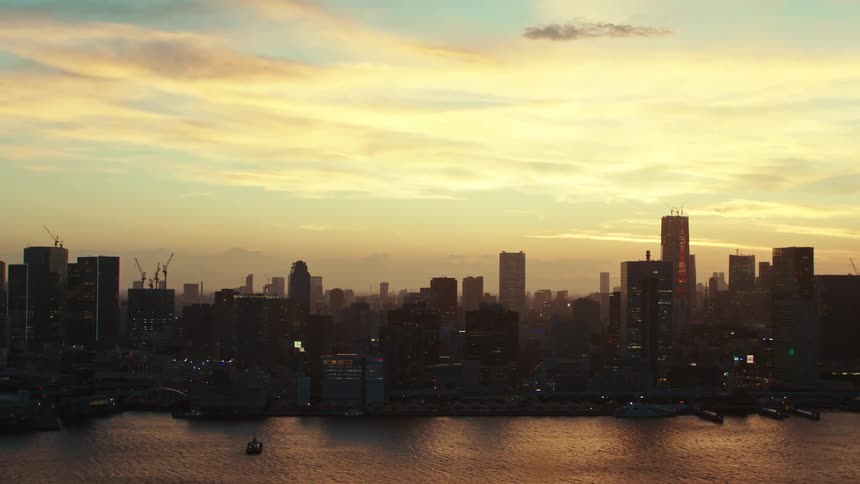 Silhouetted skyscrapers at sunset