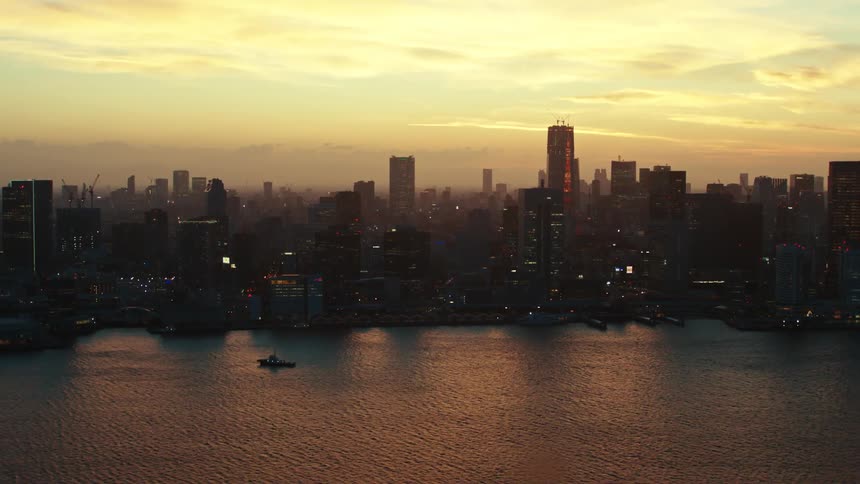 The sun is setting on the city
