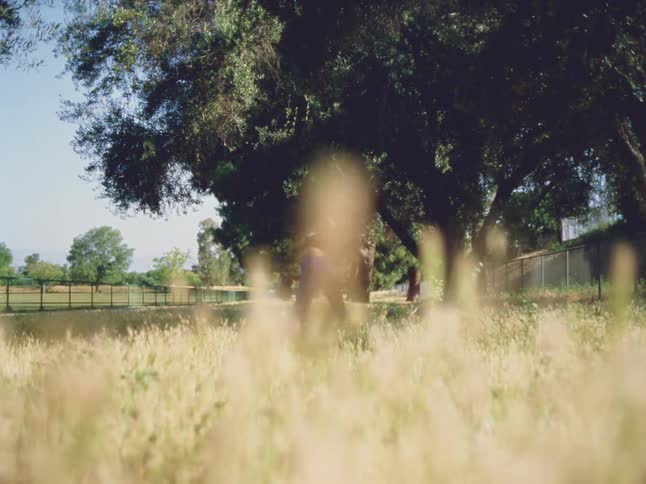 A woman dancing outdoors