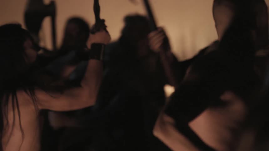 Warriors fighting with swords and battle axes