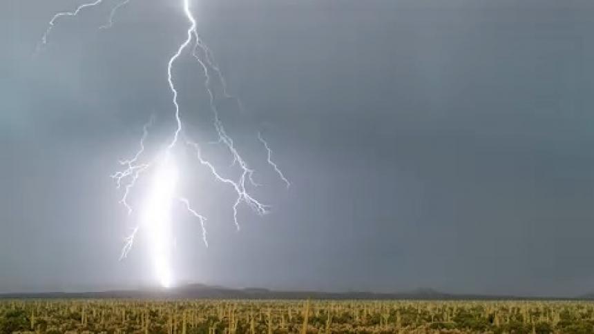 Lightning shoots through the clouds