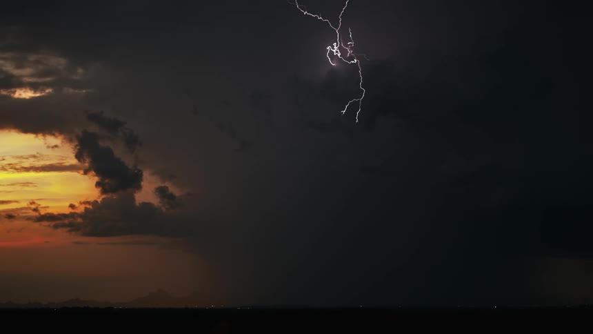 Dark clouds with thunder and lightning in the sky