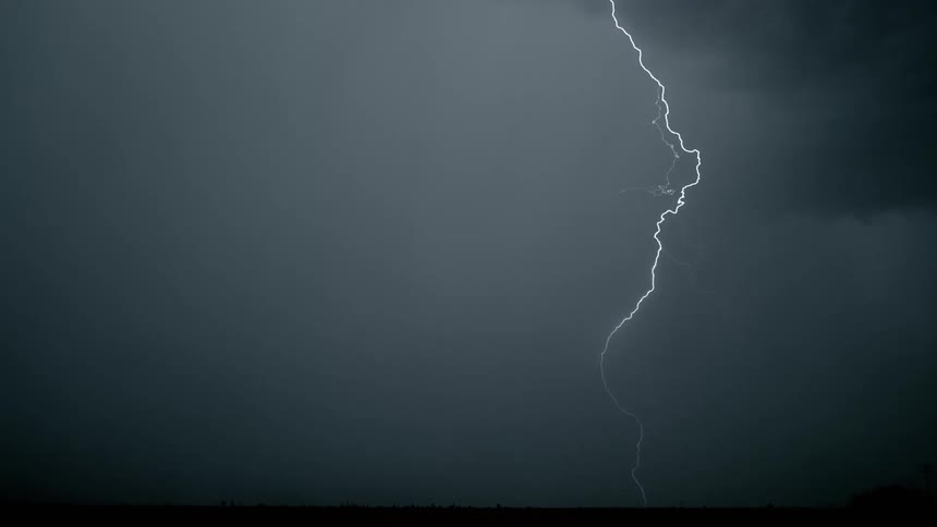 Lighting strikes ground during thunderstorm