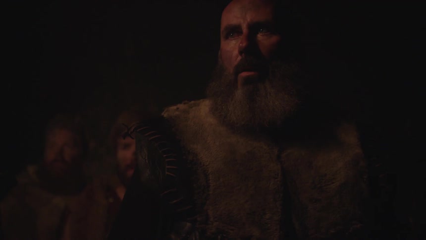 Light flickers on a bearded man