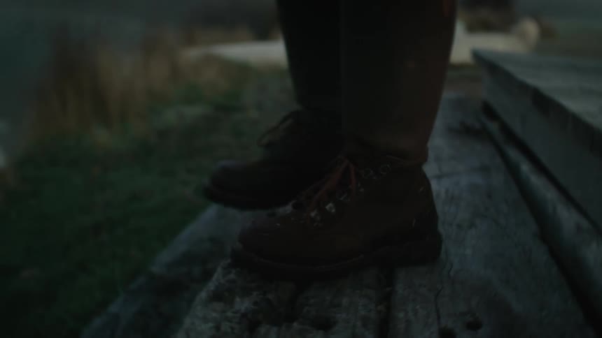 A person walks down the steps