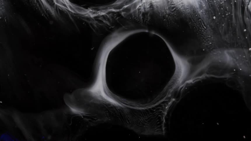 Flowing black and white liquid