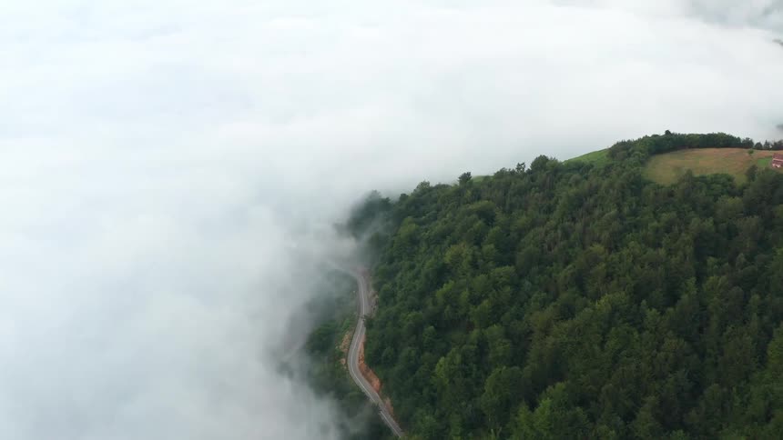 Heavy clouds roll over the mountains