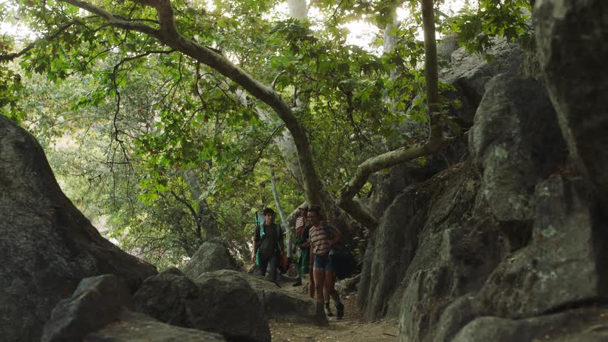 People are hiking on a trail