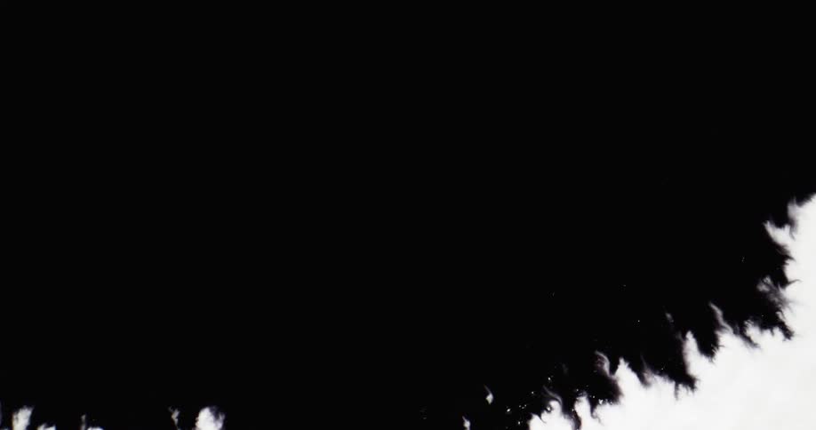 Black ink saturating white paper