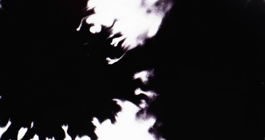 Black stains spread on white background