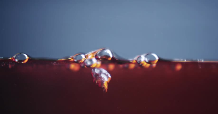 Bubbling dark brown liquid