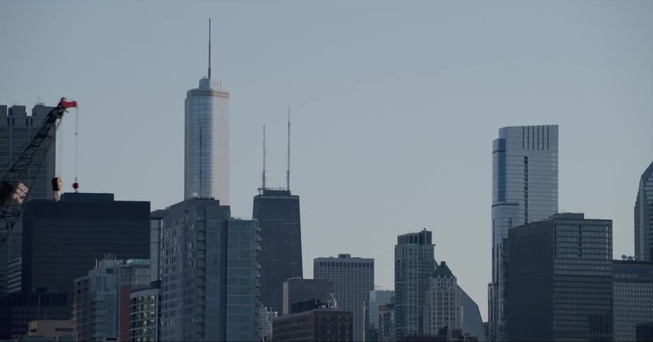 Skyscrapers and a crane in a large city
