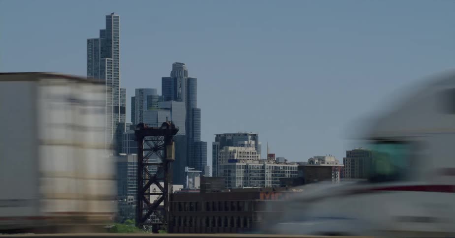 Skyscrapers on the skyline of chicago seen from a vehicle moving on the highway
