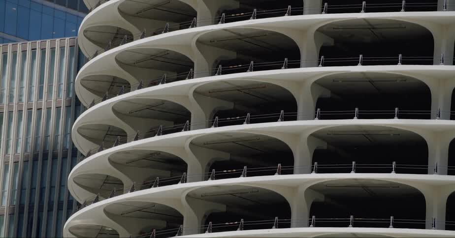A parking garage and buildings in a city