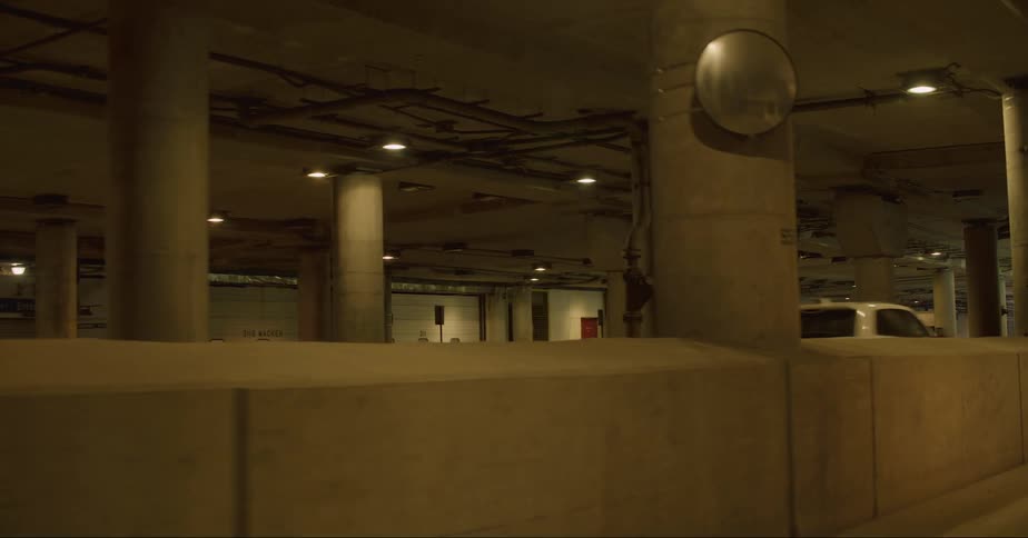 Cars and trucks traveling through an urban concrete structure