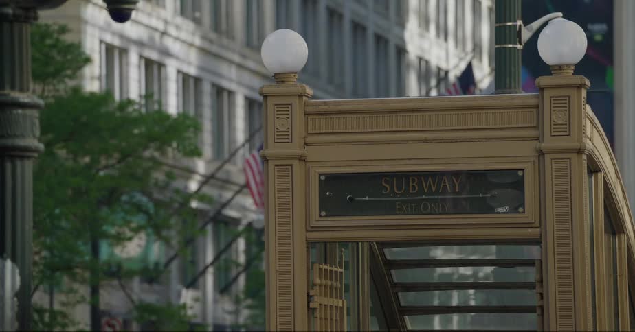 A staircase downtown leads to a subway underground