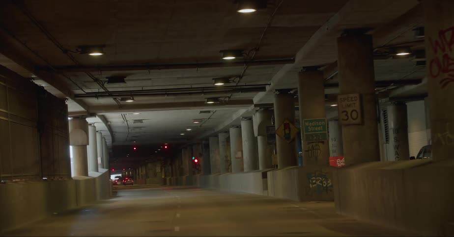 Vehicle drives in parking garage