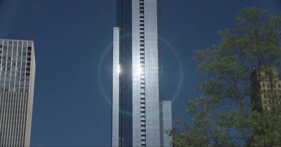 The sun shines on skyscraper in the city