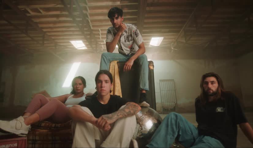 People are posing together in the room
